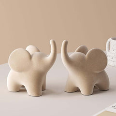 Moderne minimalistische beflockte Elefanten-Dekorationen in kleinen Größen