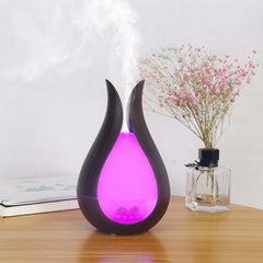 Kleiner Aromadiffusor für ätherische Öle mit Holzmaserung und Hohlraum