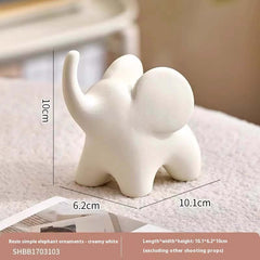 Moderne minimalistische beflockte Elefanten-Dekorationen in kleinen Größen