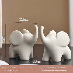 Moderne minimalistische beflockte Elefanten-Dekorationen in kleinen Größen