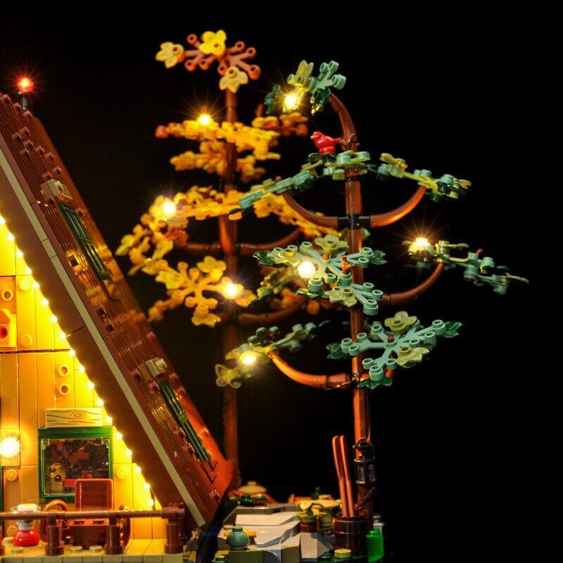 Blocs de construction de maison en bois supportant des lumières LED